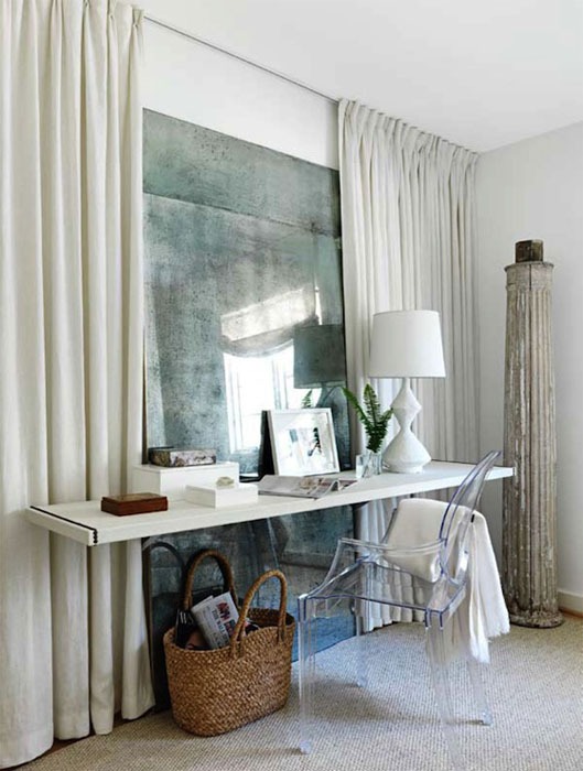 create zones in an open floor plan with curtains or draperies