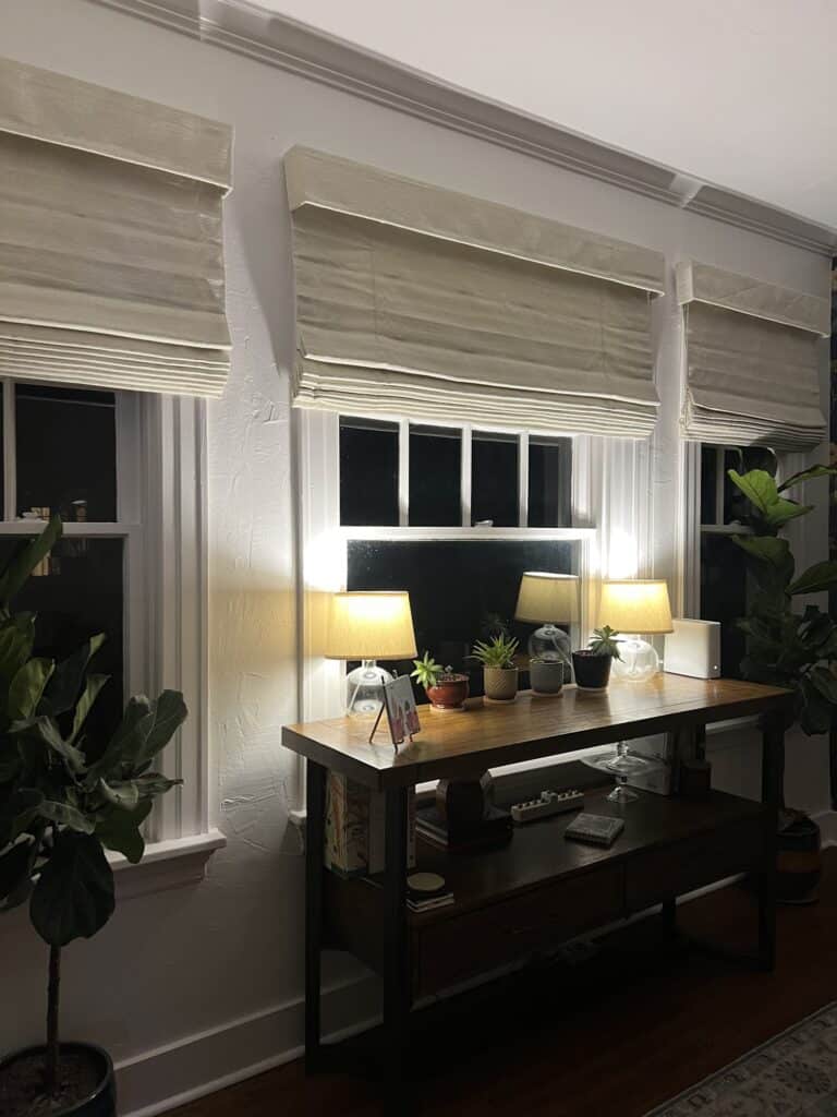 Fabric roman shades in dining room of 100 year old home in fort Worth, TX