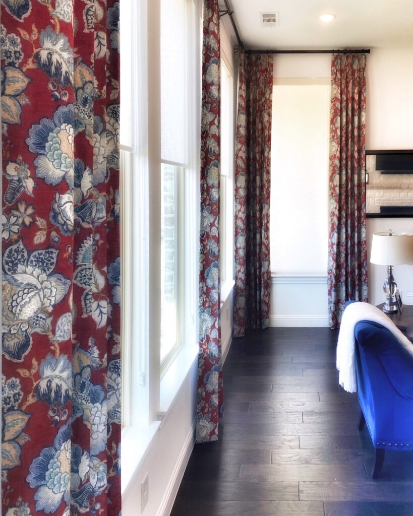 Red and Blue Decorative Drapery Panels in living room in Lantana - best window treatments for longevity