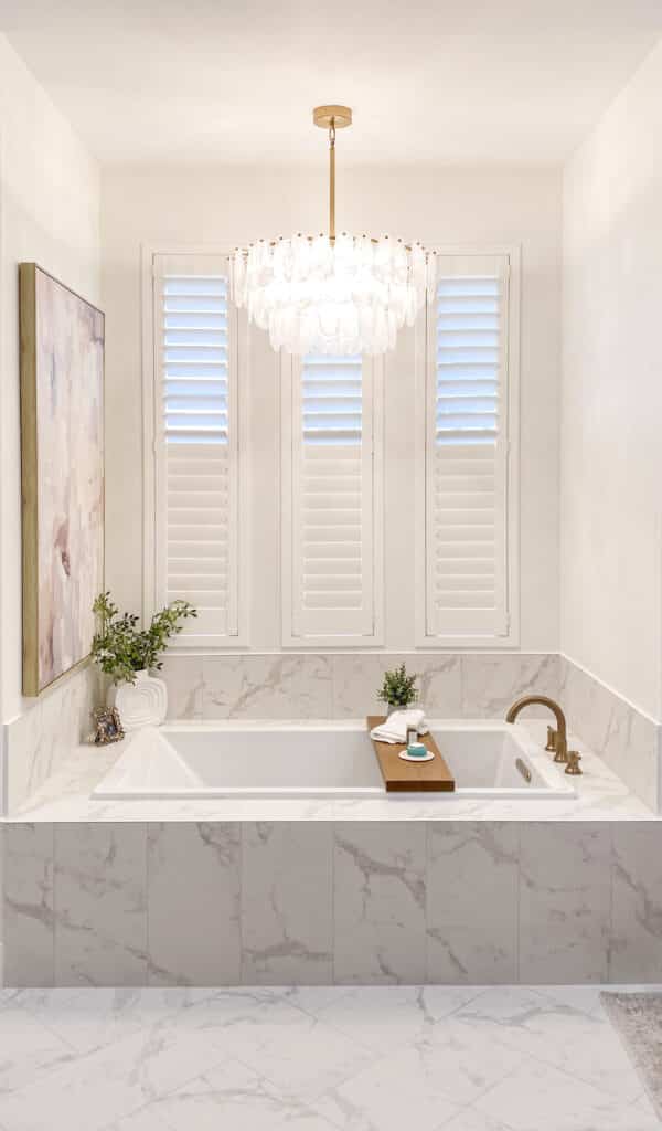 Norman Woodlore plantation shutters with invisible tilt and bullnose Z frame in a Flower Mound master bathroom renovation