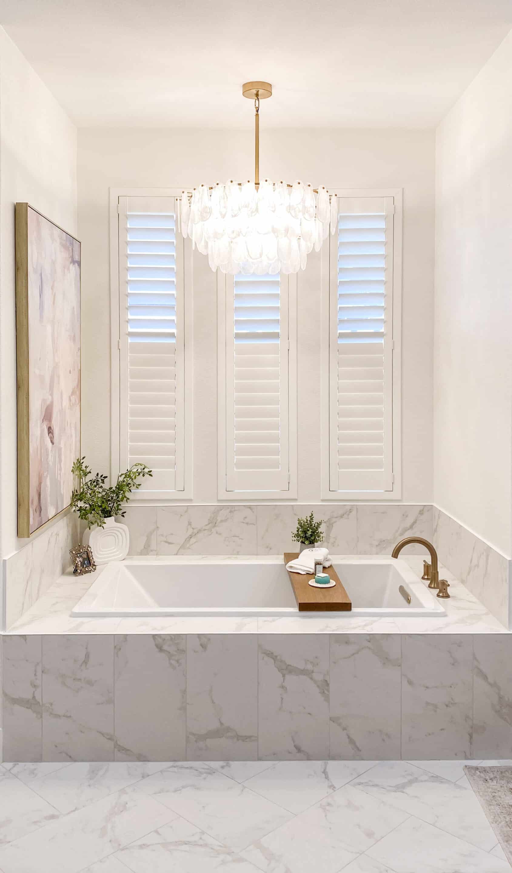 Norman Woodlore plantation shutters with invisible tilt and bullnose Z frame in a Flower Mound master bathroom renovation